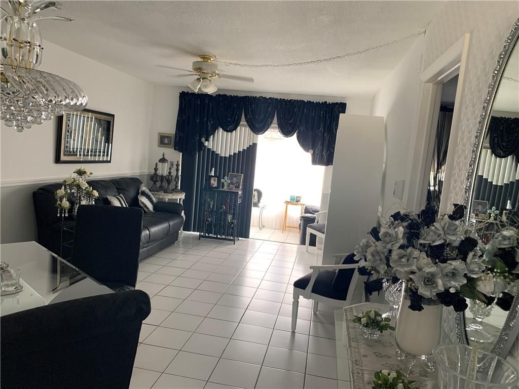 Photo of 2800 NW 47th Ter #405B, Lauderdale Lakes, FL 33313 (MLS # F10270043)