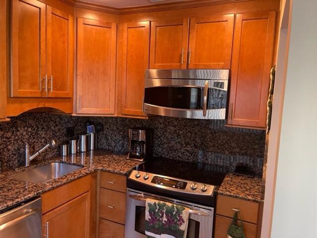 Photo of 22 Colonial Club Drive #103, Boynton Beach, FL 33435 (MLS # B26025392)