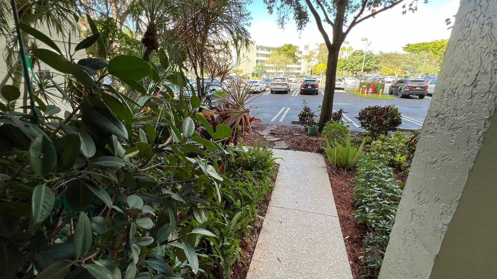 Photo of 2232 N Cypress Bend Drive #107, Pompano Beach, FL 33069 (MLS # F10411057)