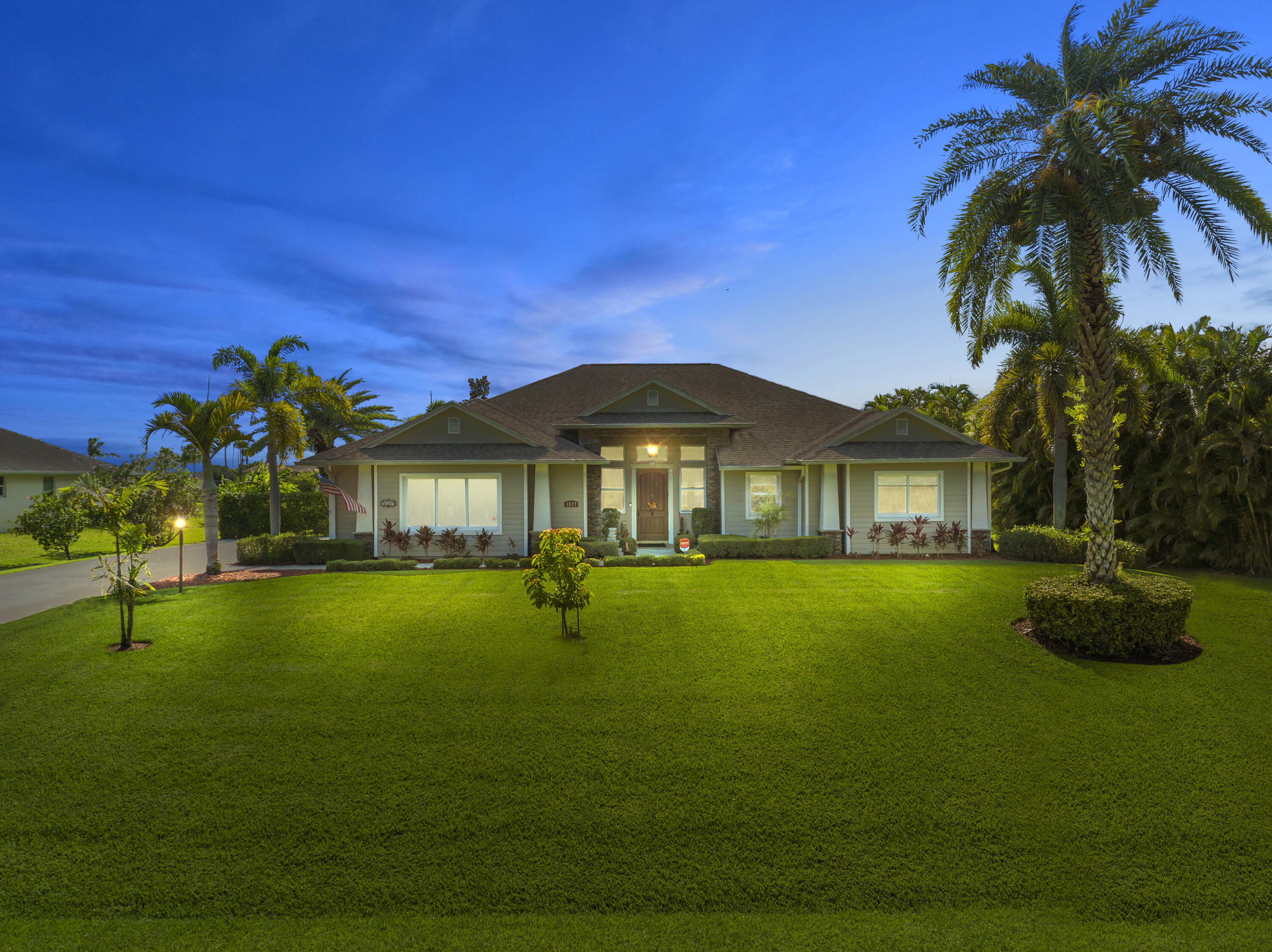 Welcome to your very own private oasis. This beautiful 4 bed/2 bath, custom CBS pool home is on .76 acres in the exclusive gated community of Fisher Lake Island. Perfectly situated on a 17 acre aerated lake and surrounded by 22,000 acres of preserve. At 2,567 square feet, the home offers plenty of room for the family to work and play. The master suite includes a separate sitting area, his & her walk in closets, and stunning master bath. Expansive open floor-plan with 12 foot ceilings. Custom features include tray ceilings, archways, crown molding, 8 foot doors, Central Vac system w/ toe-kick dust pan, Island kitchen w/ plenty of counter-space/cabinetry, large laundry room, and tons of closet space. NEW 5 ton AC, NEW generator, NEW pool heater,