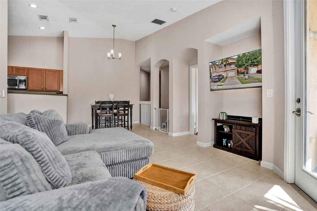 Photo of 1825 Sonrisa Drive, Riviera Beach, FL 33404 (MLS # F10532891)