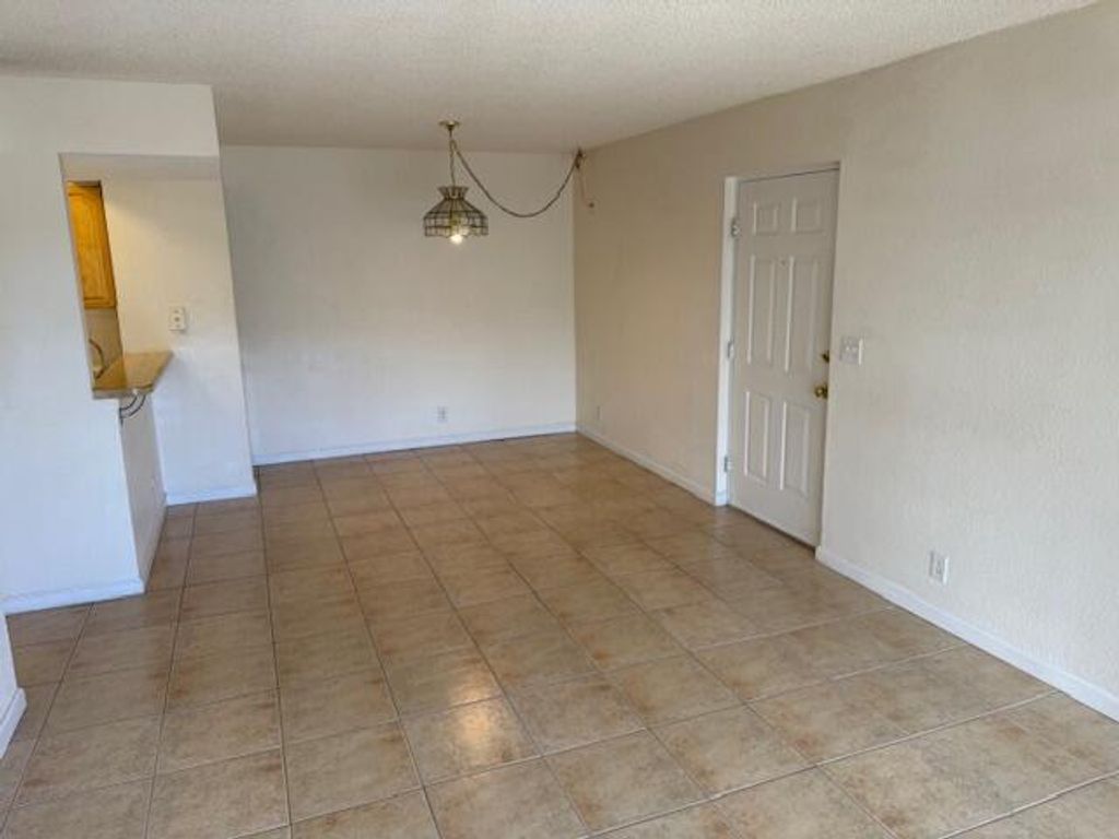 Photo of 1500 SE Royal Green Circle #203, Port Saint Lucie, FL 34952 (MLS # B26027635)