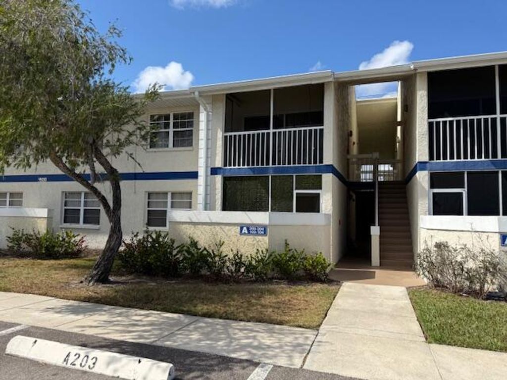 Photo of 1500 SE Royal Green Circle #203, Port Saint Lucie, FL 34952 (MLS # B26027635)