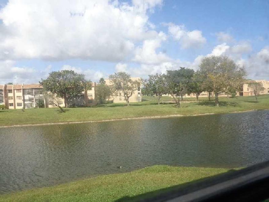 Tranquil lake view from your private balcony  and master bedroom. This move in condition corner unit is bright with lots of natural light. Stainless steel appliances, washer and dryer in the unit. Large bedrooms, two full bathrooms, large walk in closet i n Master bedroom.