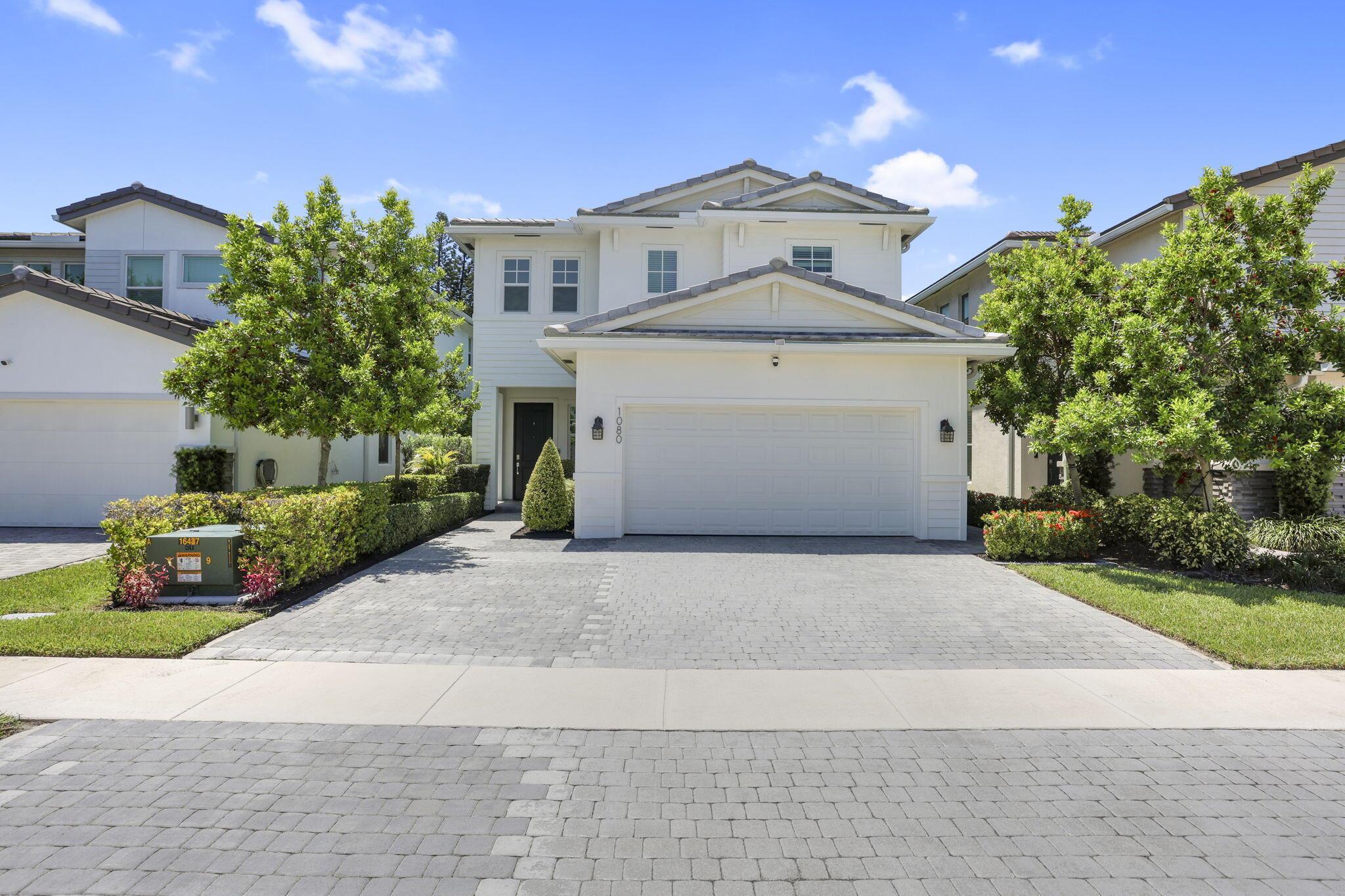 Stunningly updated 4BR, 2.5BA SMART home in the gated Veleiros community. Step inside to an open layout with a spacious first-floor office, privately enclosed by French doors, and a chef's kitchen featuring 42'' wood shaker cabinetry, quartz counters, new stainless appliances, pantry, and high-end light fixtures. Upstairs, enjoy premium scratch-resistant LVP flooring and generous bedrooms, including a luxurious primary suite with spa-like bath and oversized walk-in closet. Outside, relax in a fenced waterfront yard with gazebo, extended patio, custom paver walkways, and room for a pool. Full impact protection, widened driveway, lush landscaping. Resort-style amenities: pool, clubhouse, fitness center, playground, on-site management, and low HOA. BUYER'S AGENTS WELCOME!