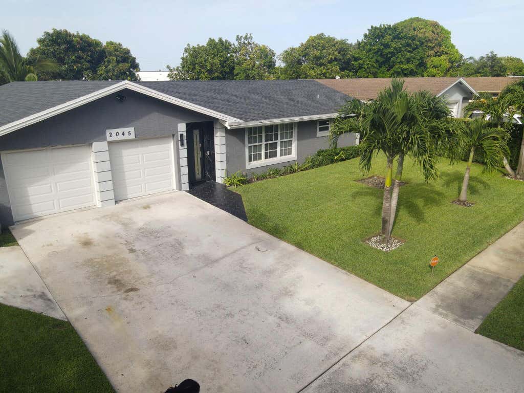 Photo of 2045 Pinehurst Drive, West Palm Beach, FL 33407 (MLS # B26052453)