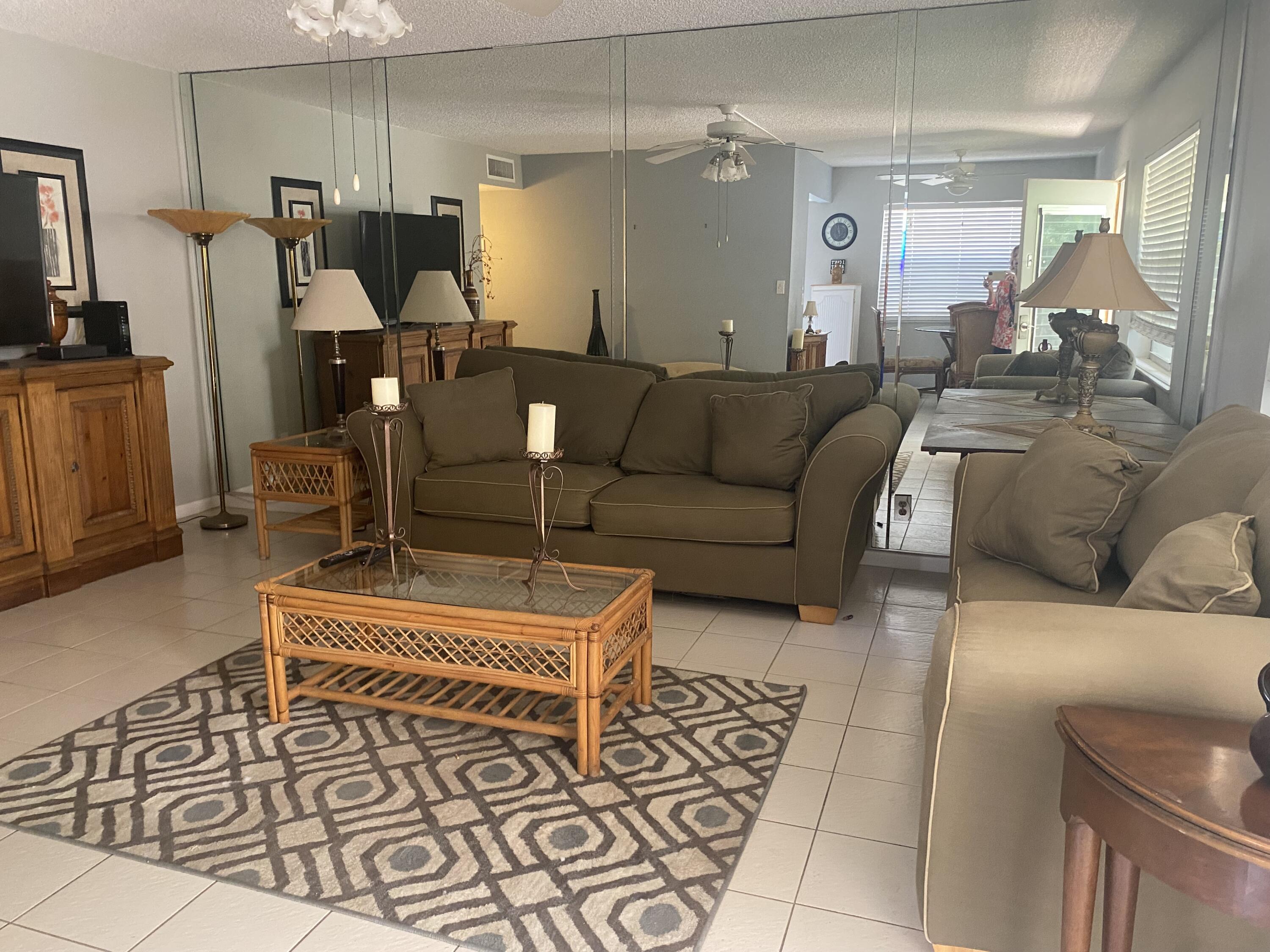 Beautiful unit with enclosed side porch. Ceramic tile - upgraded kitchen - close to Flanders clubhouse and pool. Perfect for that get=a=way...and just 6 miles from Downtown Delray Beach and historic Delray Beach. Indoor/outoor pools workout rooms, even a theatre with live entertainment - Library - art room - pool room=and much more -Courtesy bus every hour to shopping . Welcome To Florida!