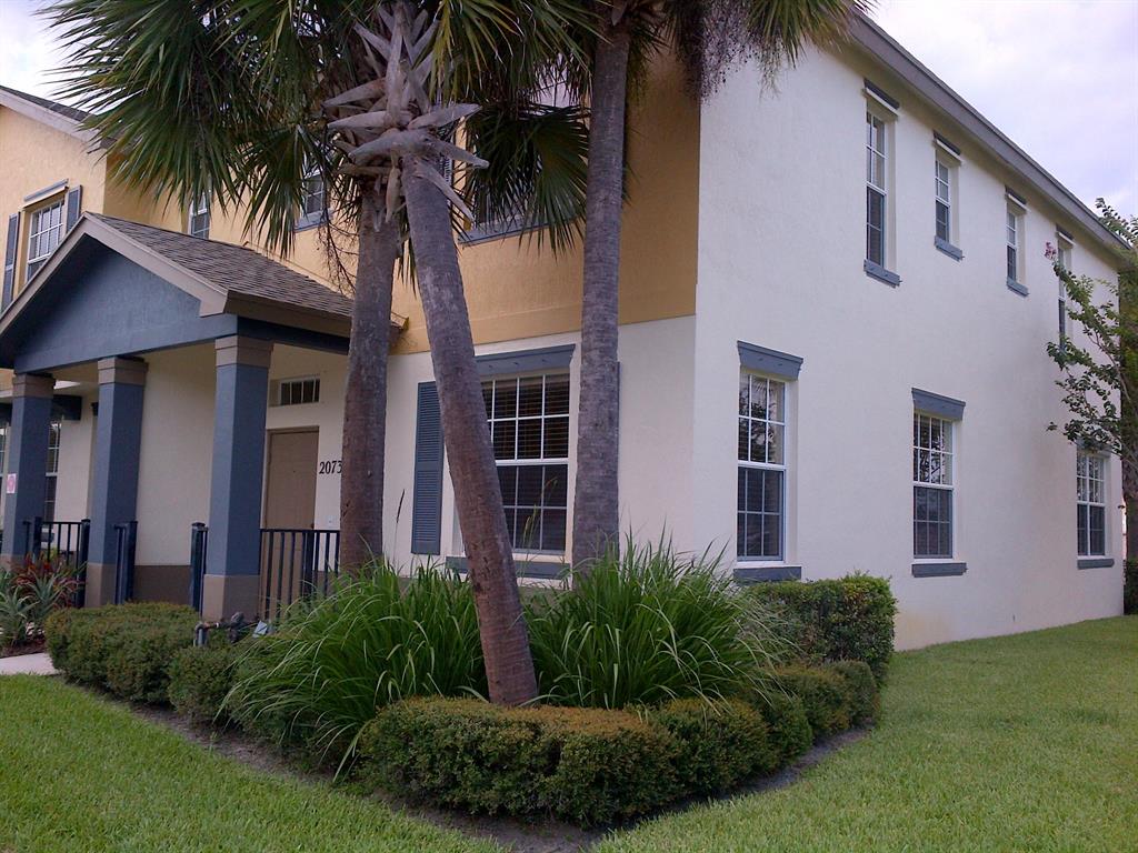 Spacious two stories townhouse 3BD/2.5 BTH corner unit with updated Wood floors in all three bedrooms upstairs and on stairs and tile in main living areas. Ceiling fans and updated fixtures. Attached garage, great community with pool and a kids park. Near US 1, hospital and mall.