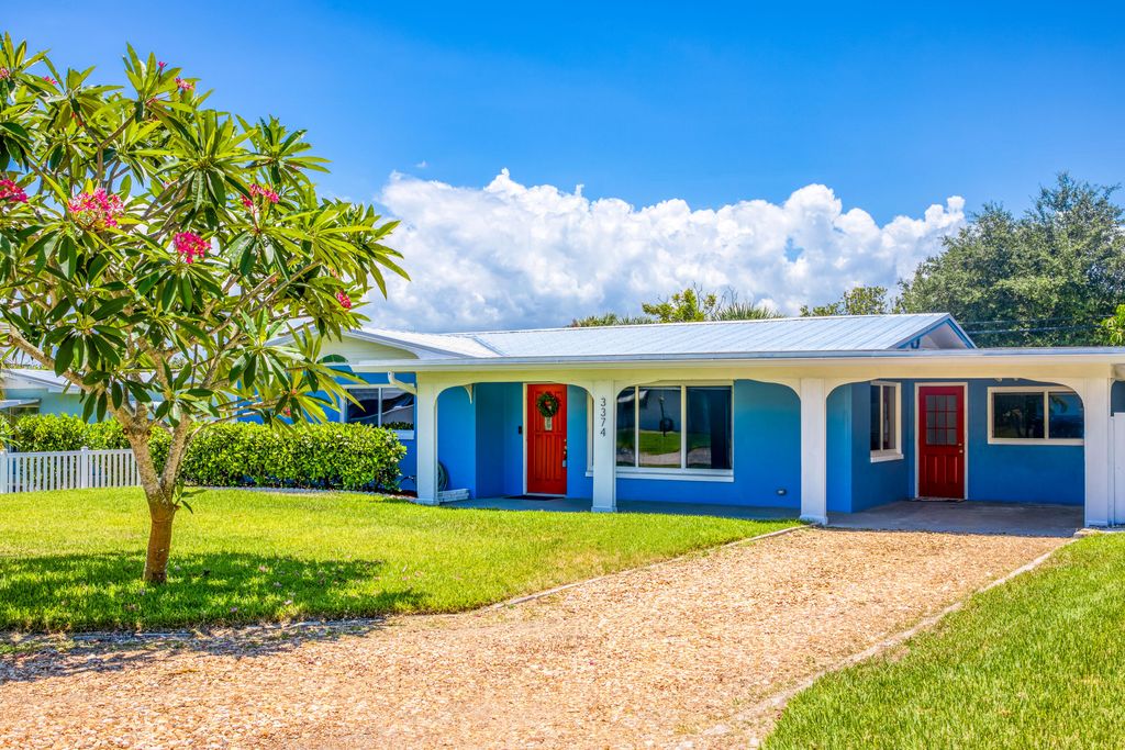 Photo of 3374 NE Sandra Drive, Jensen Beach, FL 34957 (MLS # R10988814)