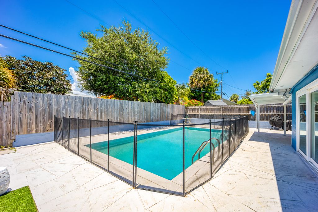 Photo of 3374 NE Sandra Drive, Jensen Beach, FL 34957 (MLS # R10988814)