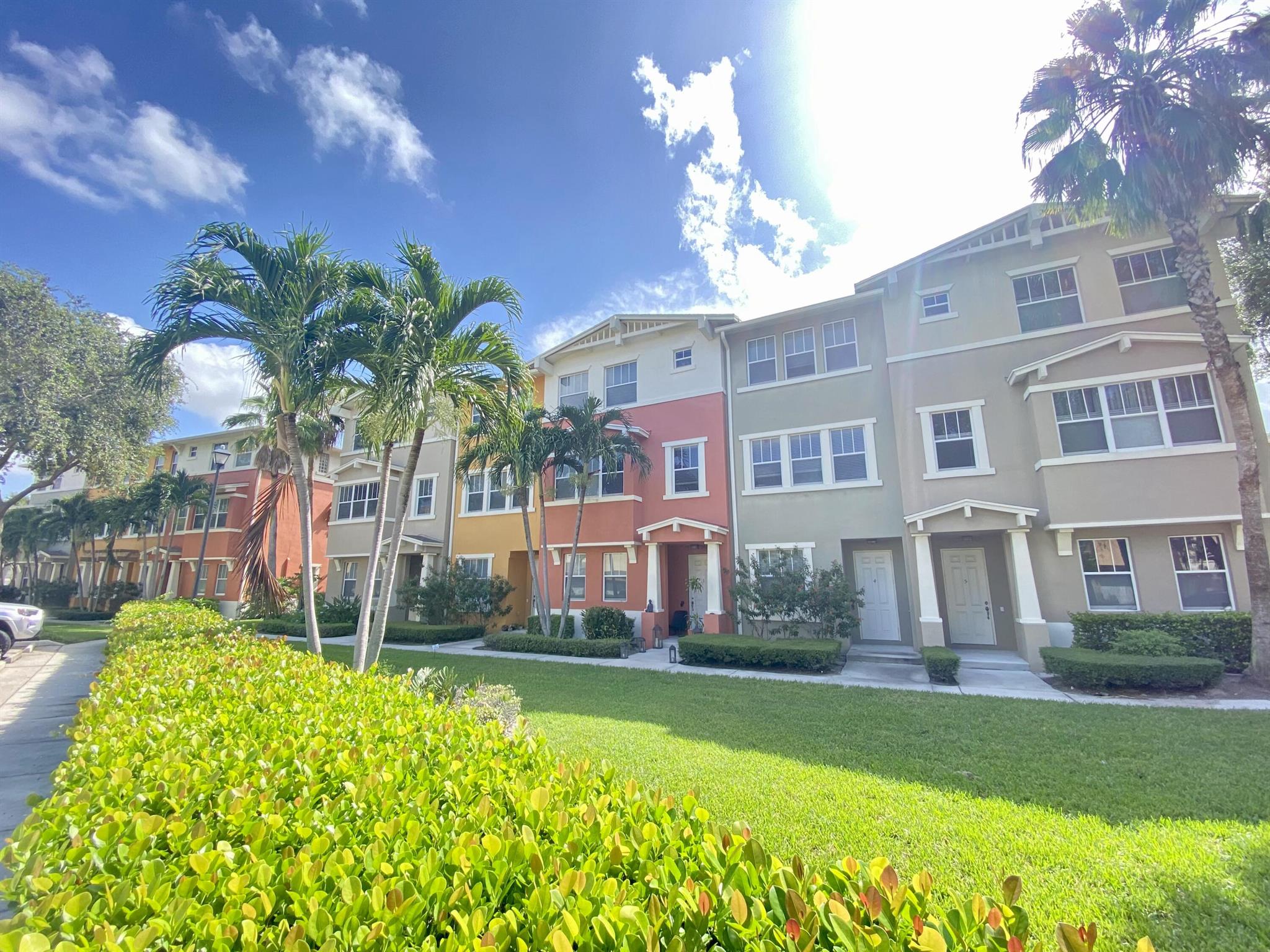 Spacious townhouse, tranquilly located in a well-maintained gated community, just a short drive away from Downtown West Palm Beach, and the I-95. The townhouse consists of 3 floors with 4 bedrooms, 3 bathrooms and one half bathroom. On the ground floor is a garage with space for 2 cars + storage. Included in monthly rental price is fibre Internet & TV 500MB, Water, Trash collection and all exterior maintenance. Tenants can freely use a wide variety of amenities like lake front swimming-pool, BBQ patio area, 24 hour fitness center, aerobics/dance room with fitness and Yoga instructor, movie theatre, social clubhouse with a full-size catering kitchen, approx. 1.7 miles of running track, and 24-hour man gated security.