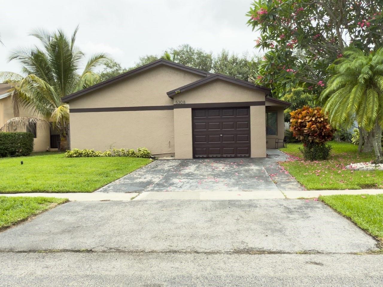 Welcome to this charming and well-maintained 3-bedroom, 2-bath pool home located in the desirable Parkwood community of West Sunrise. This home features a bright, open floor plan with laminate wood flooring throughout the living areas and bedrooms—no carpet! The spacious family room offers the perfect setting for entertaining or relaxing.
The eat-in kitchen is equipped with stainless steel appliances and offers plenty of space for casual dining. The primary suite boasts a large walk-in closet and an updated en-suite bathroom for your comfort.
Conveniently located near top-rated schools, shopping, dining, and major highways. Don’t miss the opportunity to make this beautiful Sunrise home your own!