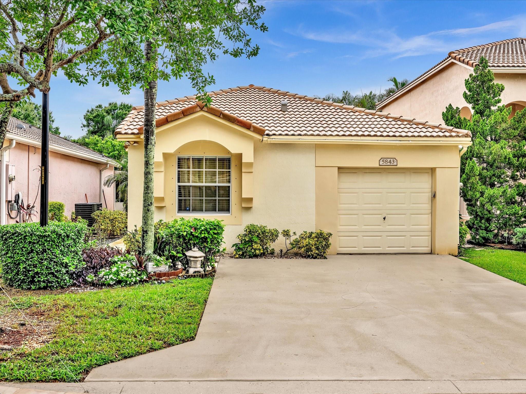 Welcome to your ideal home, where convenience meets comfort! This beautiful 3-bed, 2-bath, one-car garage, one-story gem offers a light-filled, open-concept design w/crown moldings throughout. A/C 2024. Located in the highly sought-after neighborhood of Regency Lakes, Coconut Creek w/exceptional schools & a vibrant community, this home offers everything you need for a relaxed, low-maintenance lifestyle. This is more than just a place to live—it provides a lifestyle. Relax & enjoy your private patio. Kitchen has granite countertops, stainless steel appliances, & breakfast bar. HOA includes high fiber internet, ADT security, manned gate, inside pest control & more. Community: swimming pool, spa, basketball, tennis, playground & more. Close to Sawgrass Expressway & Promenade at Coconut Creek.