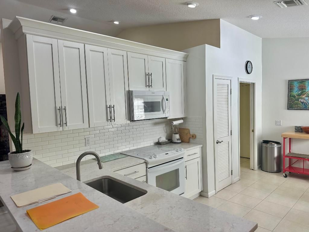 Photo of 11799 Grove Ridge Lane, Boynton Beach, FL 33437 (MLS # R11153283)