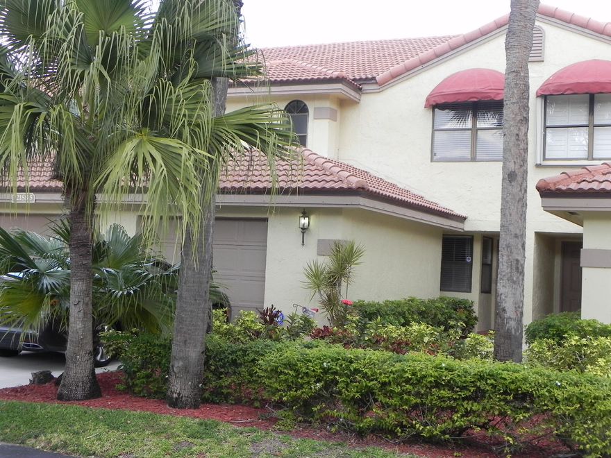 Great 3 bedroom 2 1/2 bath townhouse with screened in patio.  Newly updated wood laminate floors in main living areas and all three bedrooms. New carpet on the stairway.  Kitchen offers new Brushed Stainless GE appliances. Washer and dryer are Maytag and only 3 years new.