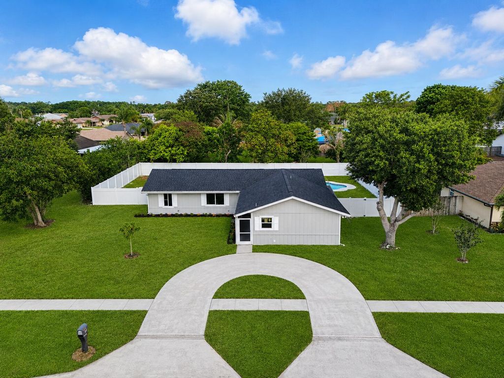 Photo of 103 Prado Street, Royal Palm Beach, FL 33411 (MLS # B26030164)
