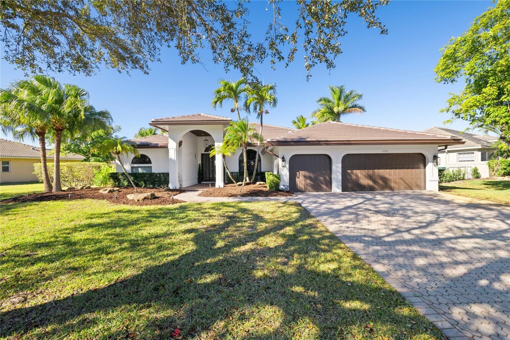 Photo of 4940 NW 110th Terrace, Coral Springs, FL 33076 (MLS # F10550883)
