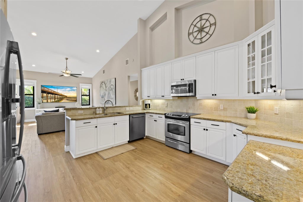 Photo of 4940 NW 110th Terrace, Coral Springs, FL 33076 (MLS # F10550883)