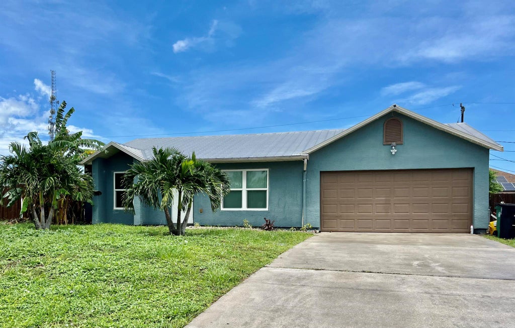 Photo of 2155 SW Azure Avenue, Port Saint Lucie, FL 34986 (MLS # R11010320)