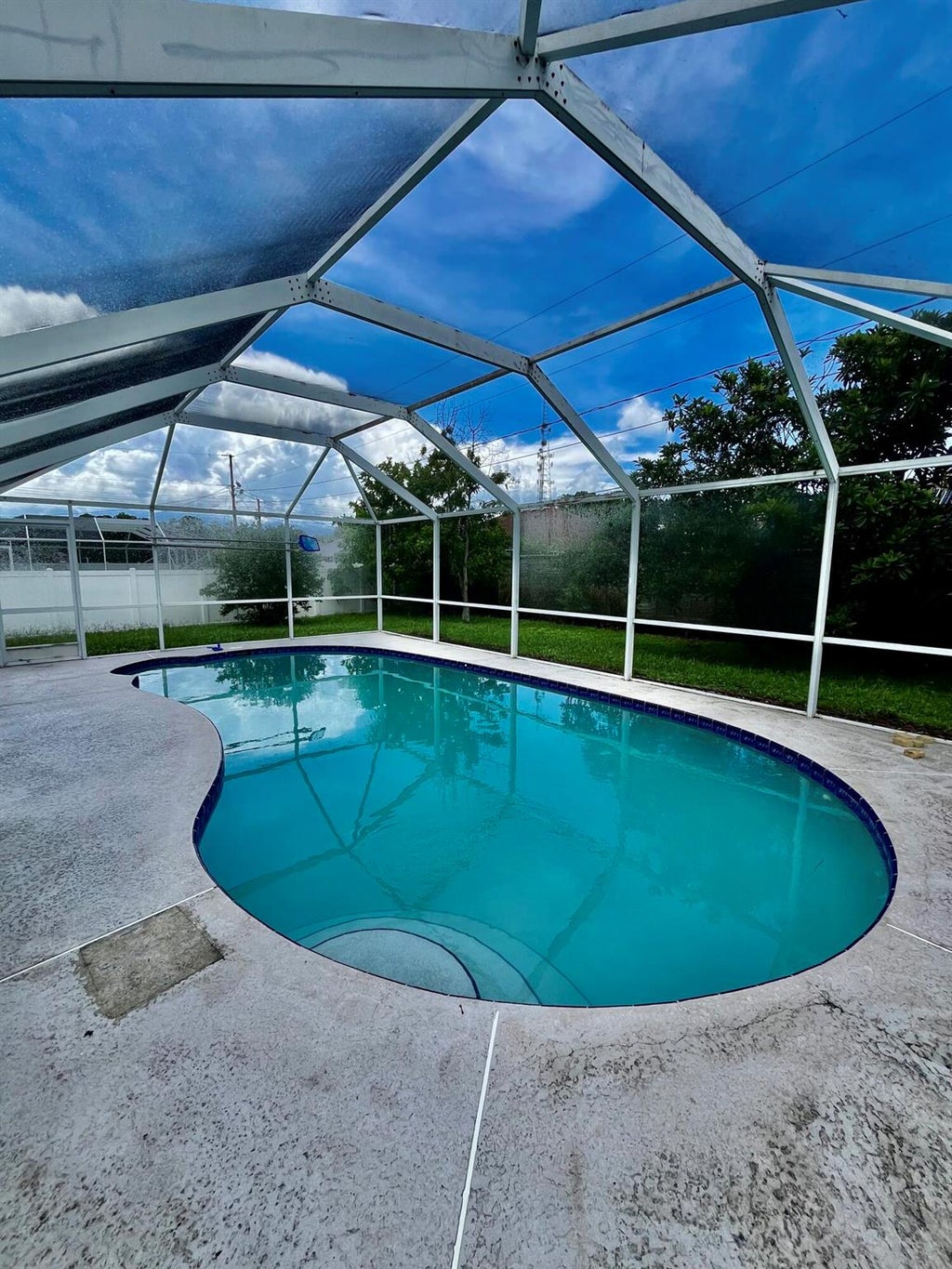 Photo of 2155 SW Azure Avenue, Port Saint Lucie, FL 34986 (MLS # R11010320)