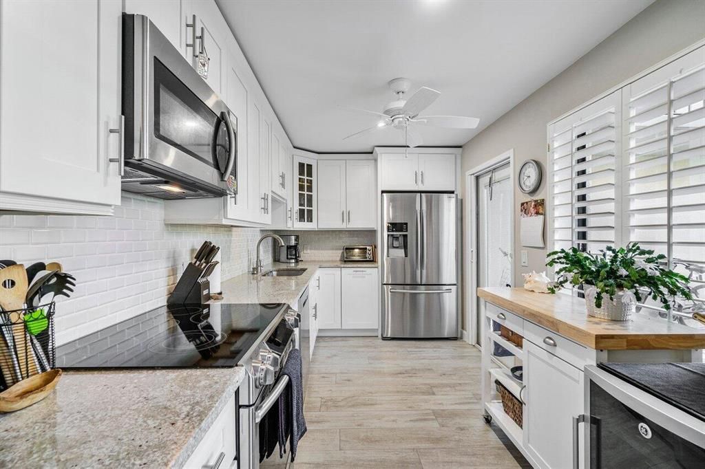 Photo of 4223 Quail Ridge Drive N #Sandpiper, Boynton Beach, FL 33436 (MLS # R10760789)