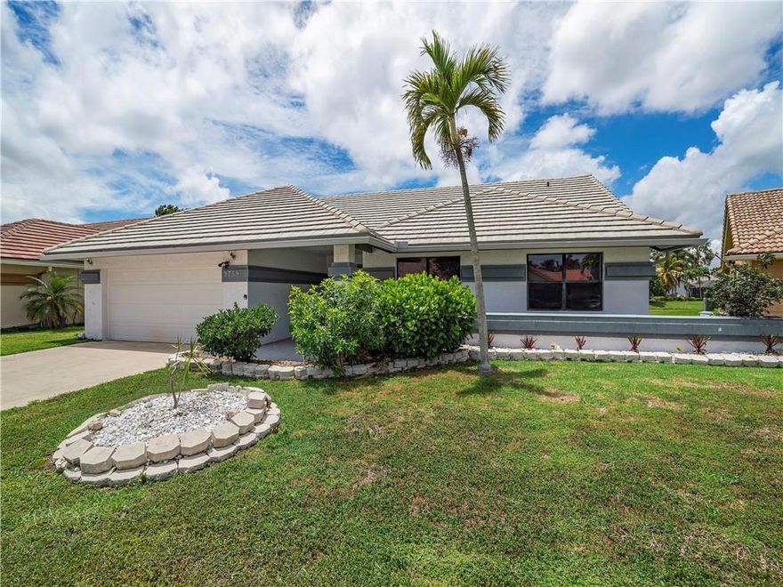 MUST SEE READY TO MOVE IN HOME with Modern/Contemporary exterior!  3 Beds/2 Bath one story home in Sun Valley.  Attractive Water View.  Backyard large enough for a pool.  Enjoy the screened patio and hot tub included with the home.  Kitchen has newer cabintets with soft close doors and drawers. Stainless steel appliances.  Hardwood floors throughout.    Updated bathrooms and humidstat included with home.  This home is an easy living home.  Spacious and great for entertaining.  Generator outlet also included.  Ths home clean and ready to move in with ease.  Square Footage Cannot Be Guaranteed.