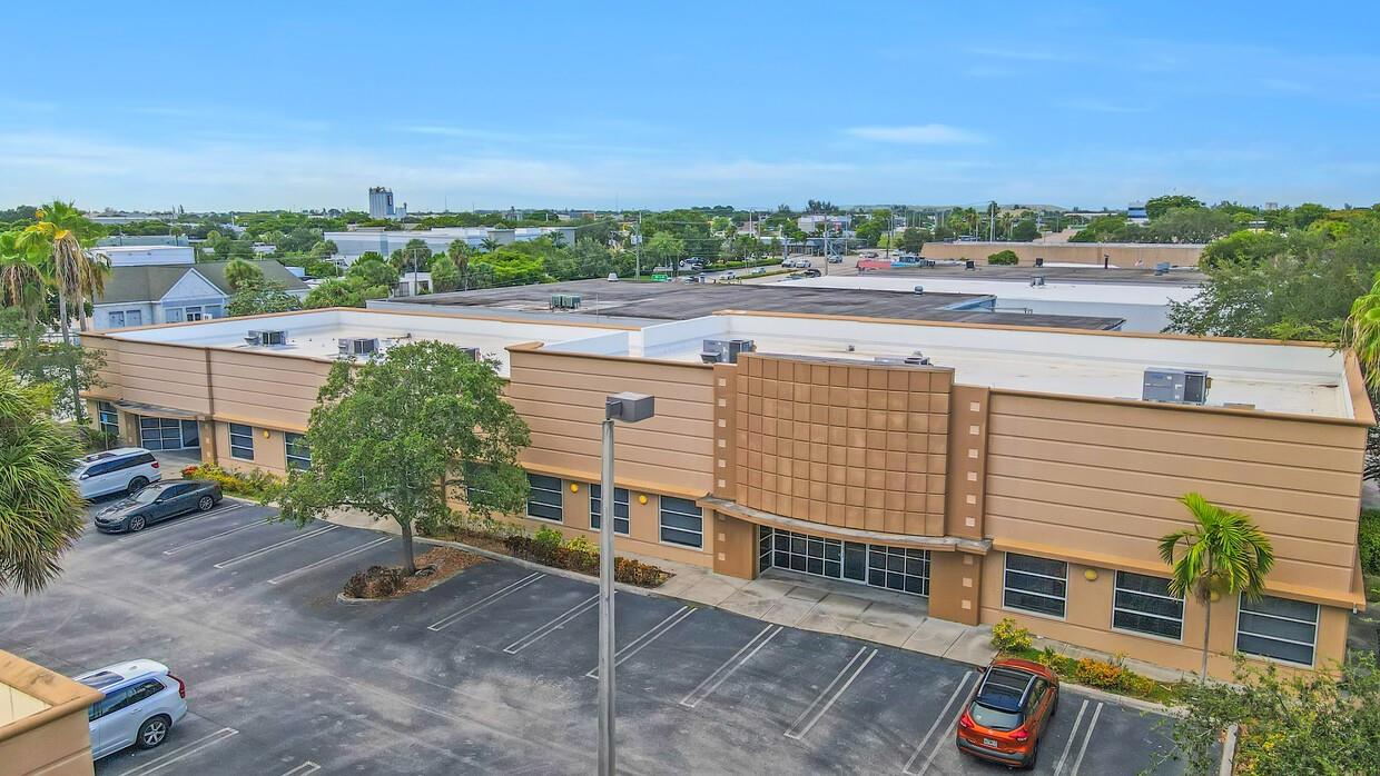 This is a newer industrial building that was fit out as a standard office. Roof was completely replaced in 2021, and the parking here is a phenomenal 4.13/1,000 ratio. Current zoning is Pompano Beach I-1 which permits a wide variety of industrial uses as well as most office and retail. There is a lot of existing infrastructure that will save future tenants time and cost on their build-out. Suite 203: Column free open floorplan offering optimized space planning. Tons of natural light. 14'-18' ceiling heights. 24/7 accessibility. 4.3/1,000 parking ratio. Flexible I-1 General Industrial Zoning allows for many uses: Call Centers, Light Manufacturing, Research and Development, Professional Office, Vocational Schools, Shooting Range