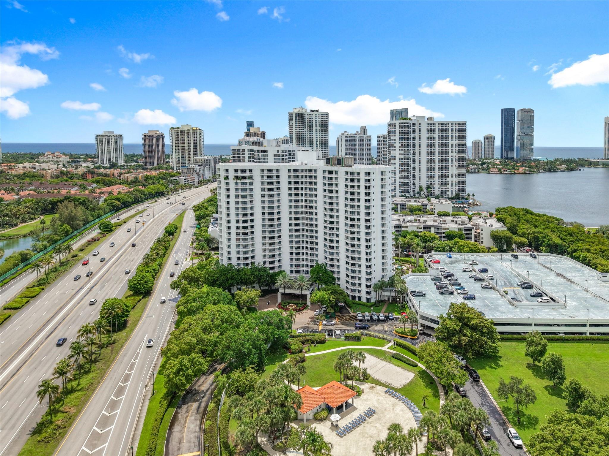Stunning 2-bed/2bath renovated (3rd bed open and used as a den) first-floor corner unit steps to the pool from your unit, in the heart of Aventura. Remodeled custom Italian kitchen cabinets, top/stainless appliances, view of the pool, 9-foot ceiling, and a great private sitting area near the pool, all for you. This fabulous, luxurious building features two lagoon-style heated pools, a cabana, a club room, a lounge bar, high-speed internet, a fitness center, and a deli. A must-see!! <<<<<< OWNER FINANCING AVAILABLE CALL AGENT FOR DETAIL >>>>>>>>>>>>