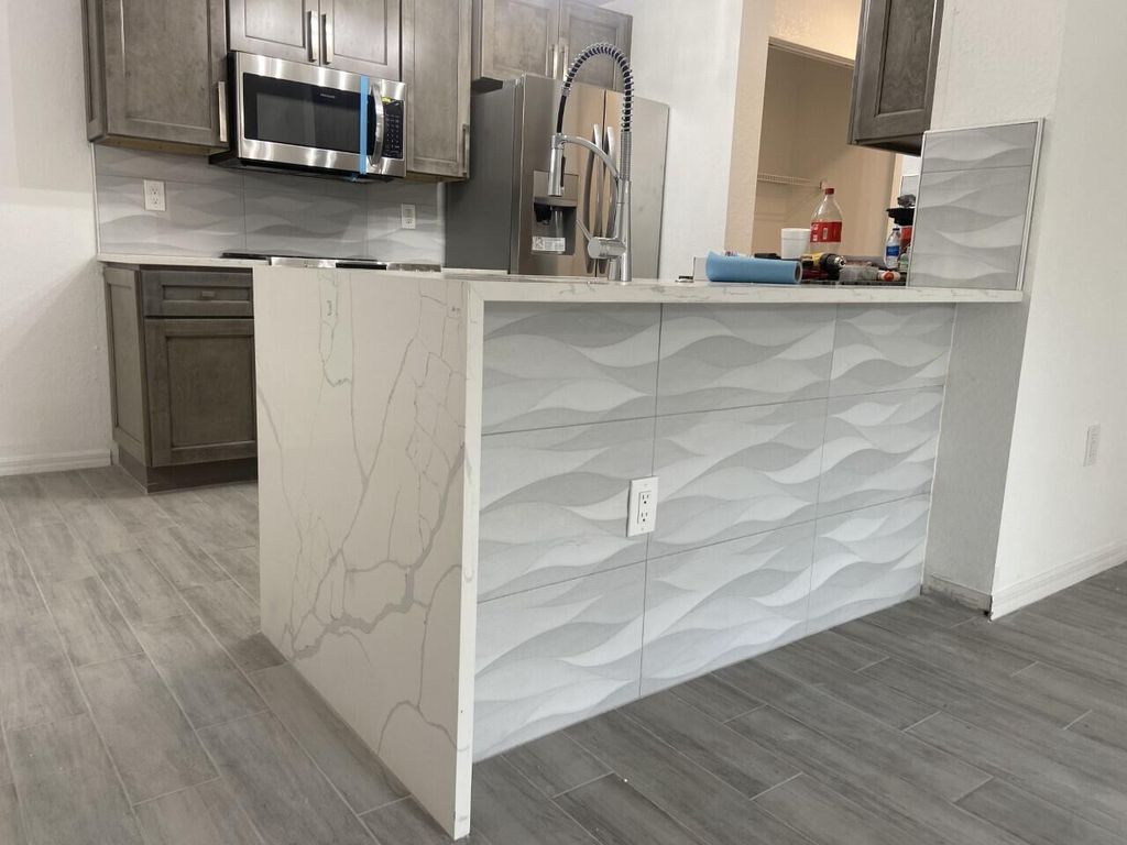 Photo of 2807 Veronia Drive #102, Palm Beach Gardens, FL 33410 (MLS # R11017067)