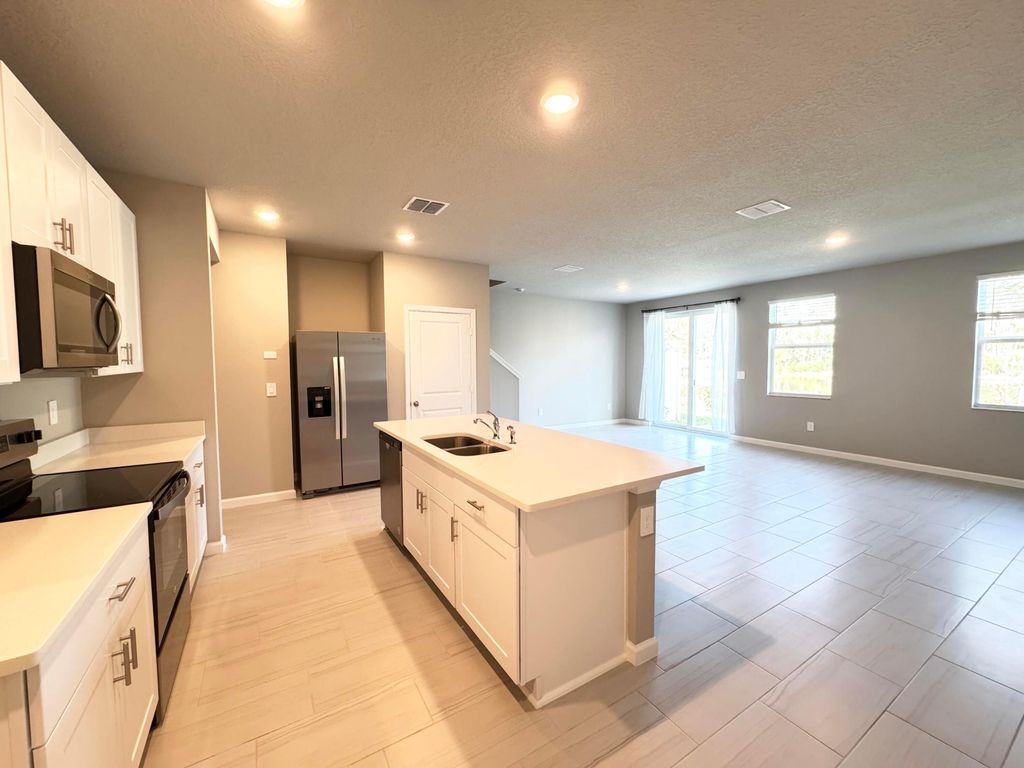 Photo of 5788 SE Edgewater Circle, Stuart, FL 34997 (MLS # R11046577)