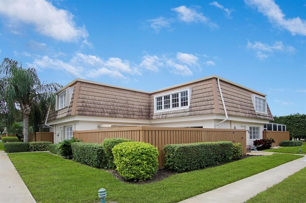 Photo of 11687 Ficus Street #D, Palm Beach Gardens, FL 33410 (MLS # R10758517)