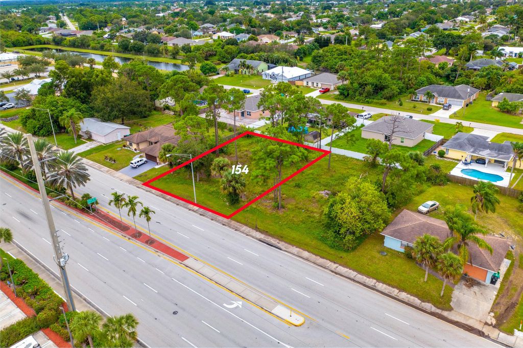 Photo of 154 SW Port St Lucie Boulevard, Port Saint Lucie, FL 34984 (MLS # B26035513)