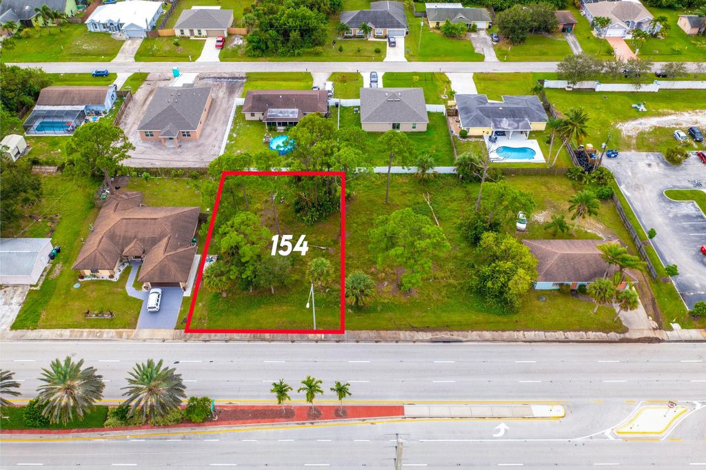 Photo of 154 SW Port St Lucie Boulevard, Port Saint Lucie, FL 34984 (MLS # B26035513)
