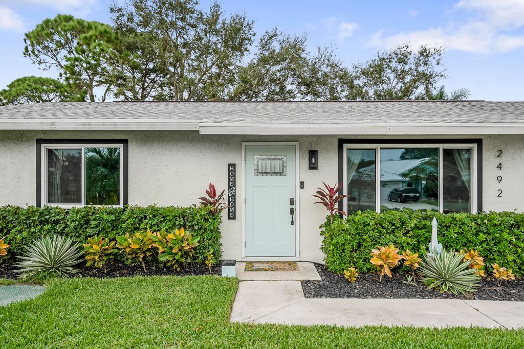Photo of 2492 SE Marius Street, Port Saint Lucie, FL 34952 (MLS # R11039331)