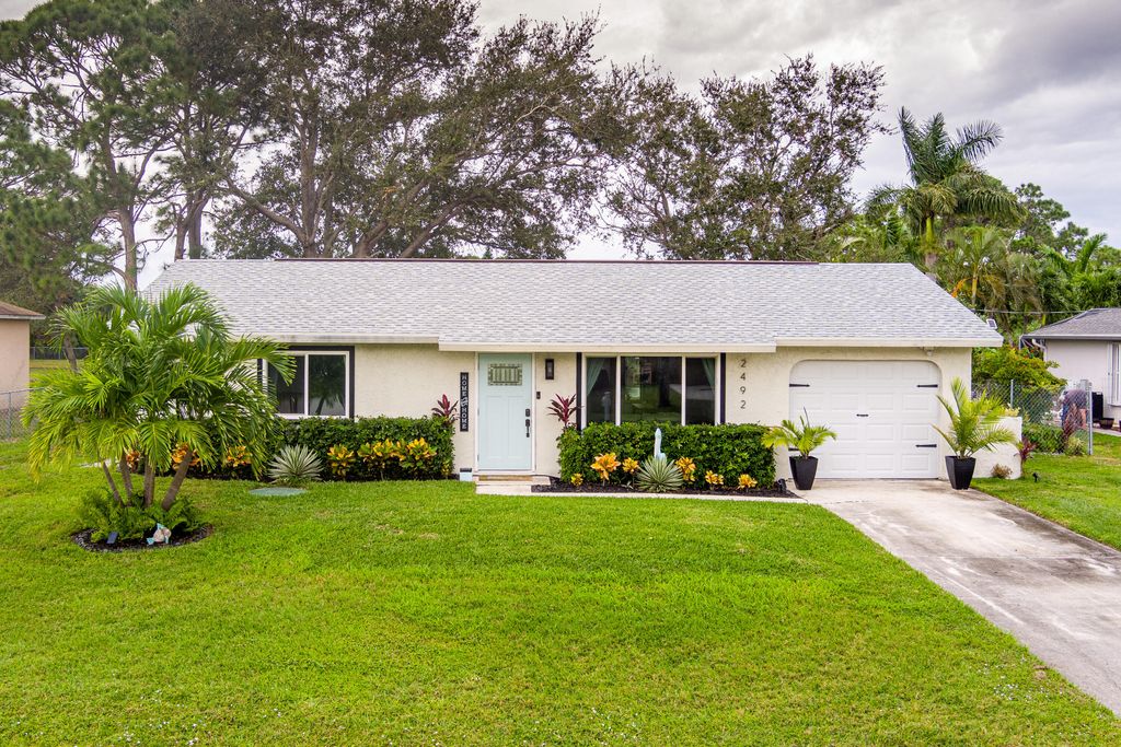 Photo of 2492 SE Marius Street, Port Saint Lucie, FL 34952 (MLS # R11039331)