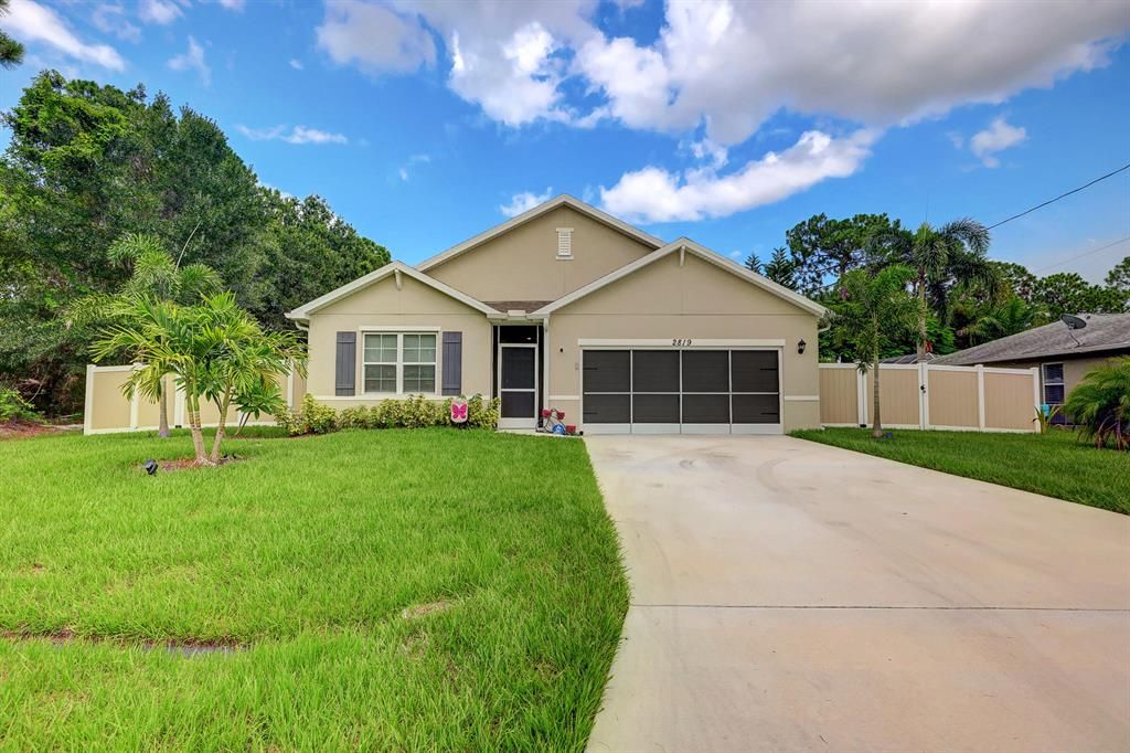 Photo of 2819 SW East Louise Circle Cir, Port Saint Lucie, FL 34953 (MLS # R10818832)