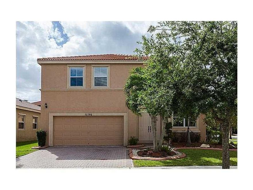 SPECTACULAR LUXURY HOME ON CORNER LOT IN DESIRABLE GUARD GATED COMMUNITY OF RIVIERA ISLES! HOME BOASTS AMAZING UPGRADES INCLUDING DARK DISTRESSED LAMINATE WOOD FLOORING THROUGHOUT DOWNSTAIRS, LARGE OPEN KITCHEN W/ GRANITE TOPS, HIGH-END STAINLESS STEEL KI TCHENAID APPLIANCES, FRESH PAINT THROUGHOUT, LARGE BEDROOMS W/ 1 FULL BED & BATH DOWNSTAIRS, DARK WOOD PLANTATION SHUTTERS, DUAL A/C UNITS, LARGE MASTER BED W/ BONUS SITTING AREA OR OFFICE, HURRICANE PANELS & MUCH MORE! A-RATED SCHOOLS! WILL NOT LAST!