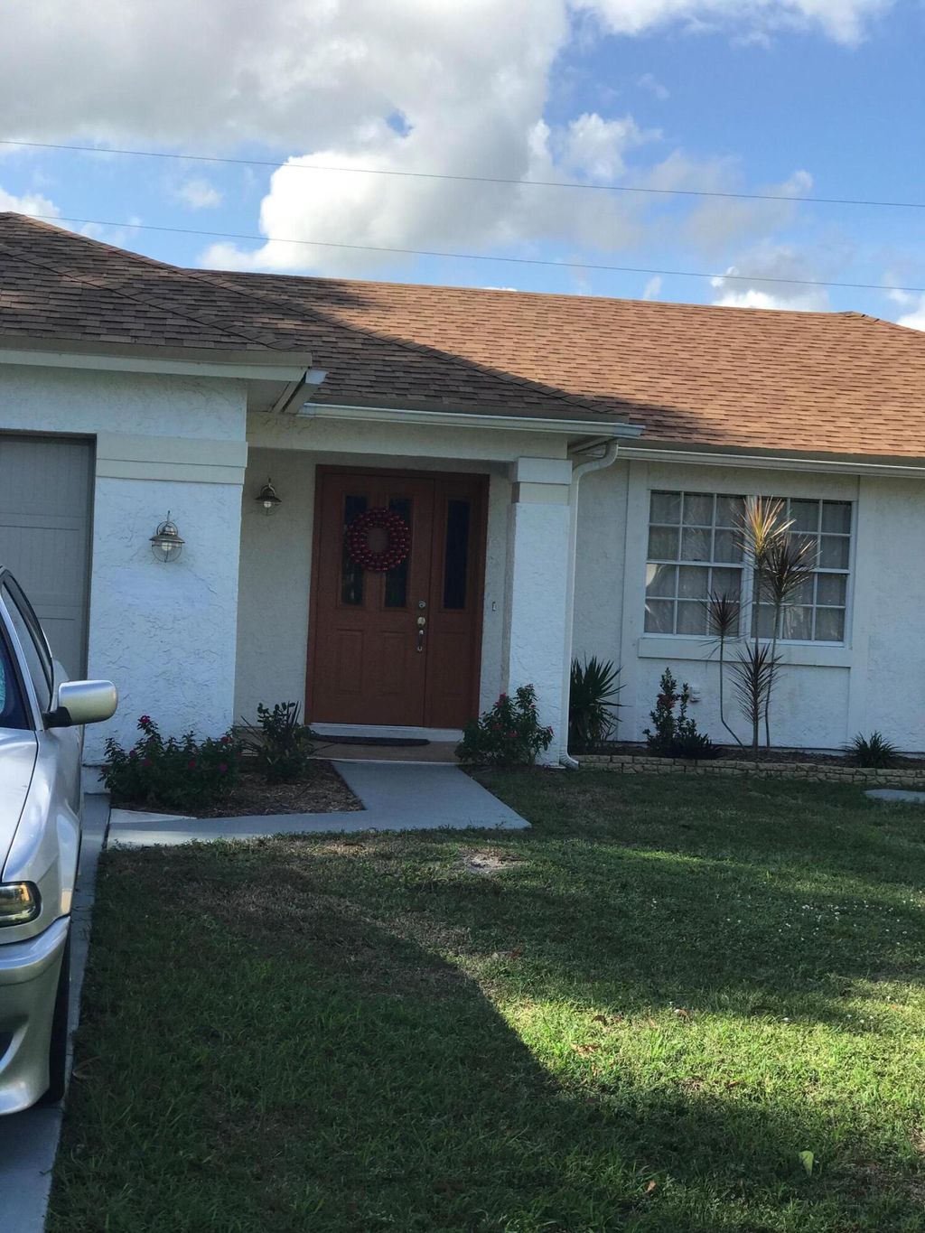 Photo of 2586 SE Rock Springs Drive, Port Saint Lucie, FL 34952 (MLS # R10817973)
