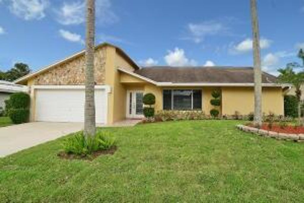 Photo of 3306 NW 28th Terrace, Boca Raton, FL 33434 (MLS # R10983857)