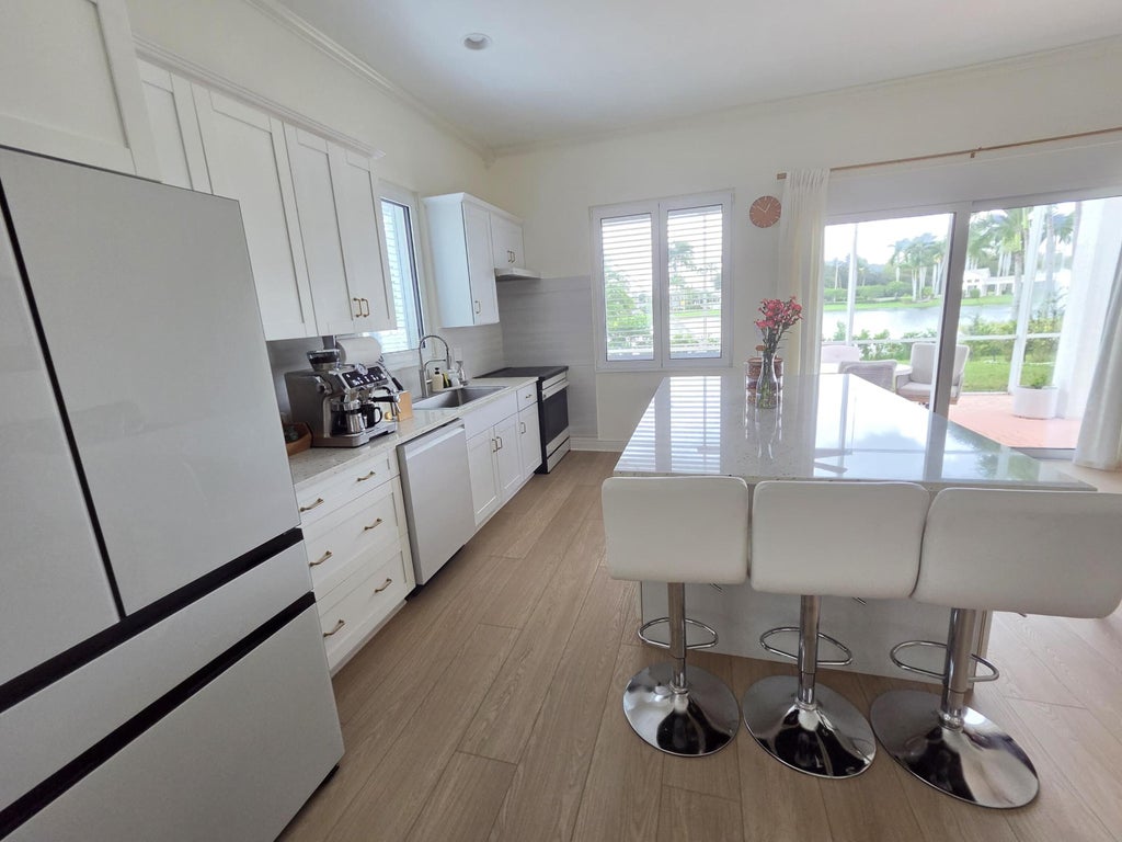 Photo of 1210 Oakwater Drive, Royal Palm Beach, FL 33411 (MLS # B26083133)