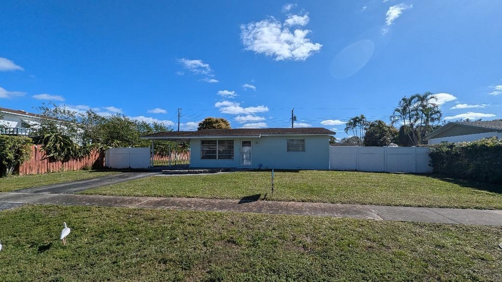Photo of 1280 Berkshire Drive, West Palm Beach, FL 33406 (MLS # R11050871)