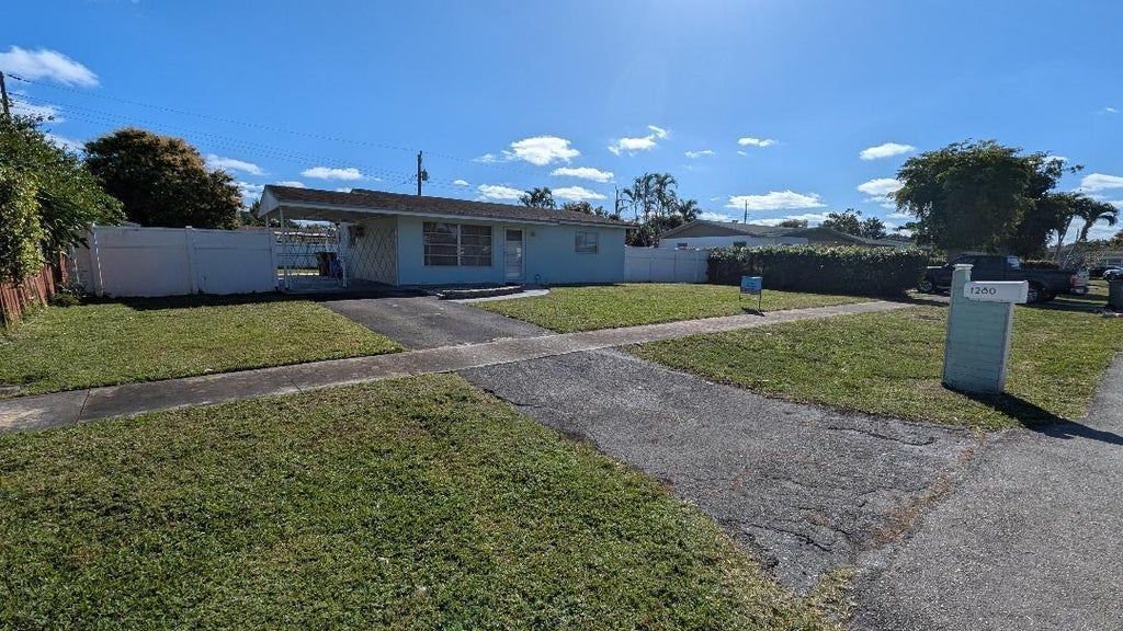 Photo of 1280 Berkshire Drive, West Palm Beach, FL 33406 (MLS # R11050871)