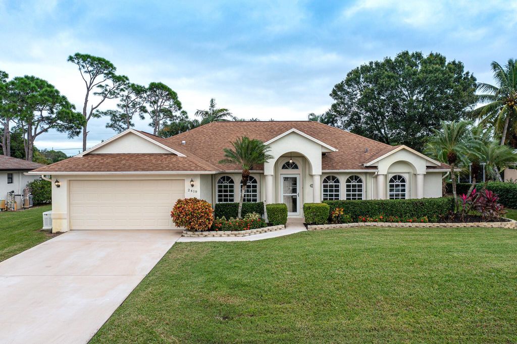 Photo of 2419 SE Wishbone Road, Port Saint Lucie, FL 34952 (MLS # R10937352)