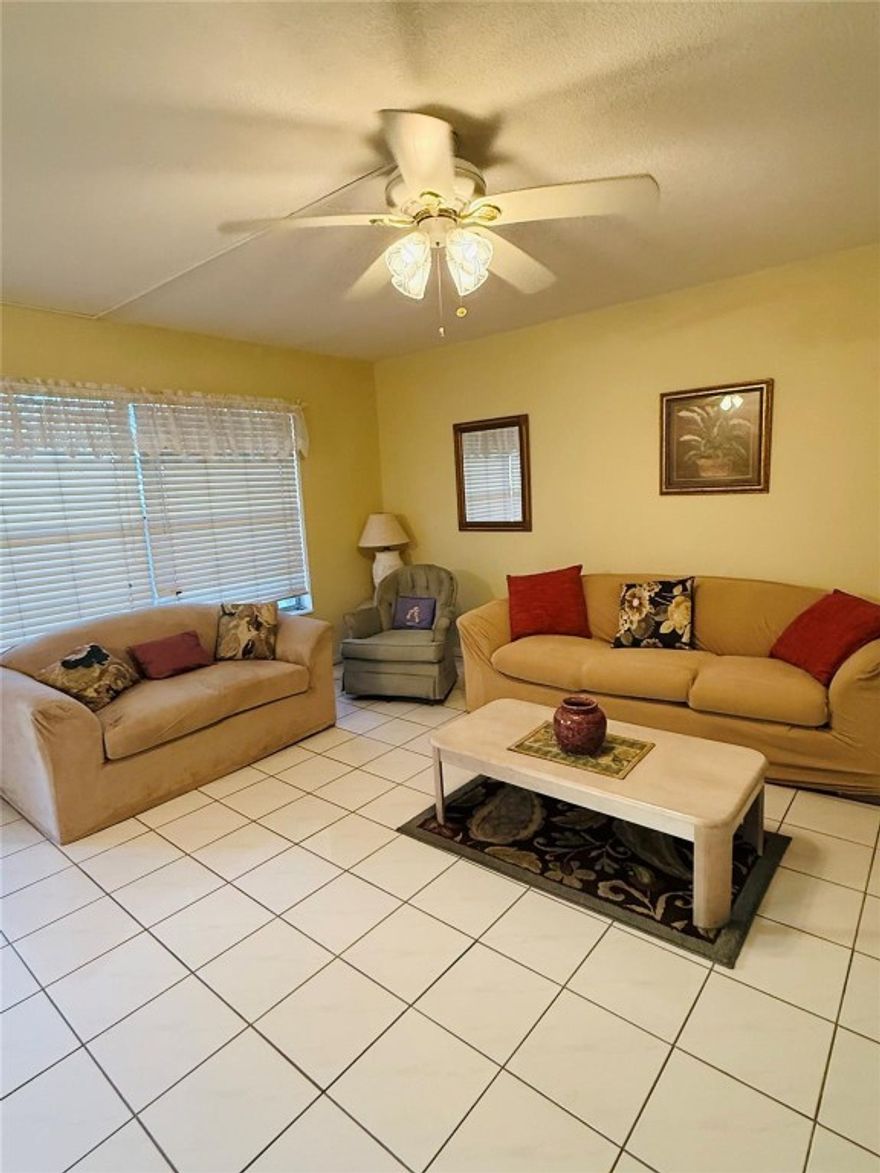 Welcome to easy living in this fully furnished 2-bedroom, 2-bath home located in a highly active senior community filled with amenities and organized activities. This home features durable tile flooring throughout, a recently updated air conditioner, and a peaceful screened patio ideal for morning coffee or evening relaxation. Finished in soft, natural tones. Minutes from shopping centers and convenient transportation options. Welcome to easy living in this fully furnished 2-bedroom, 2-bath home located in a highly active senior community filled with amenities and organized activities. This home features durable tile flooring throughout, a recently updated air conditioner, and a peaceful screened patio ideal for morning coffee or evening relaxation. Finished in soft, natural tones. Minutes from shopping centers and convenient transportation options.
