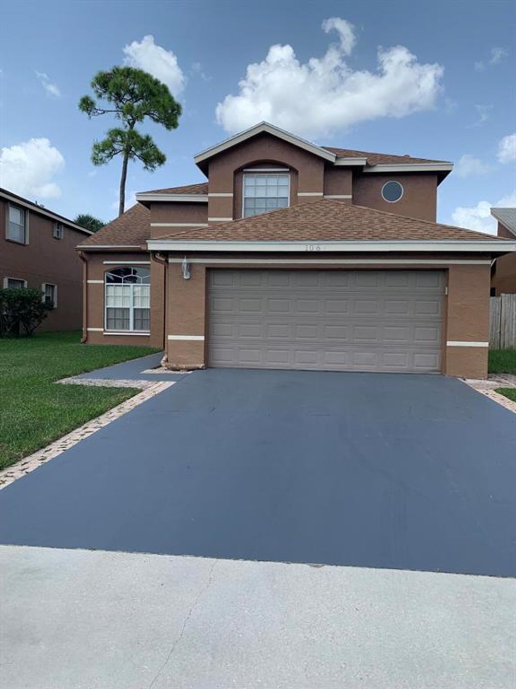 Photo of 106 Heatherwood Drive, Royal Palm Beach, FL 33411 (MLS # R10768323)