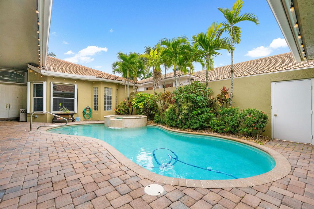 Photo of 8024 Laurel Ridge Court, Delray Beach, FL 33446 (MLS # R10954390)