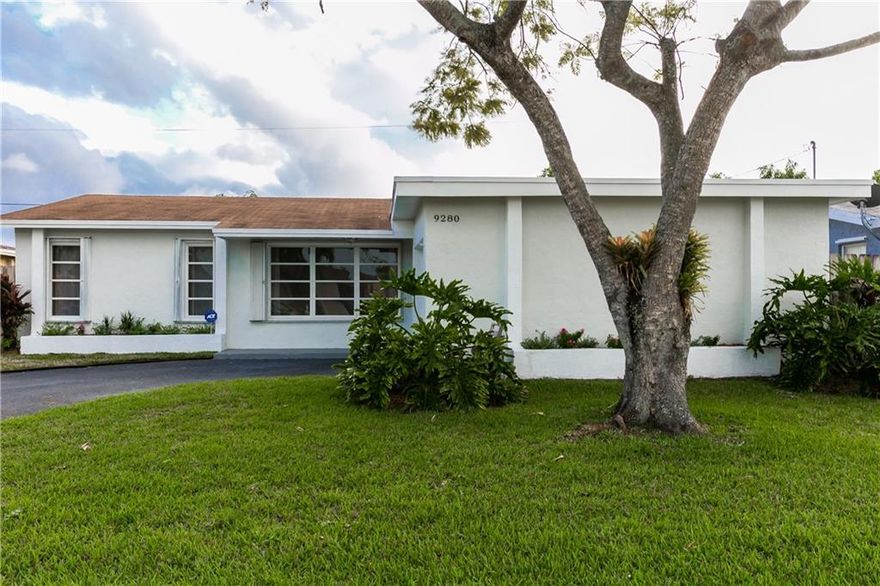 BEAUTIFULLY UPDATED AND SPACIOUS 3 BEDROOM 2 BATH HOME WITH FAMILY ROOM AND GARAGE IN SUNRISE GOLF VILLAGE*WOOD LIKE TILE FLOORS THRU OUT MAIN LIVING AREA*LARGE EAT IN KITCHEN WITH WOOD CABINETS, GRANITE COUNTER TOPS,STAINLESS STEEL APPLIANCES & TILE FLOOR*LARGE MASTER SUITE WITH WALK-IN CLOSET AND NICELY UPDATED MASTER BATH*SPLIT BEDROOM FLOOR PLAN*LARGE ROOMS THRU OUT*GUEST BATHROOM HAS BEEN REMODELED AND HAS A SPA TUB*FRENCH DOORS*FRESHLY PAINTED INSIDE AND OUT*SHOWS GREAT!!!!!