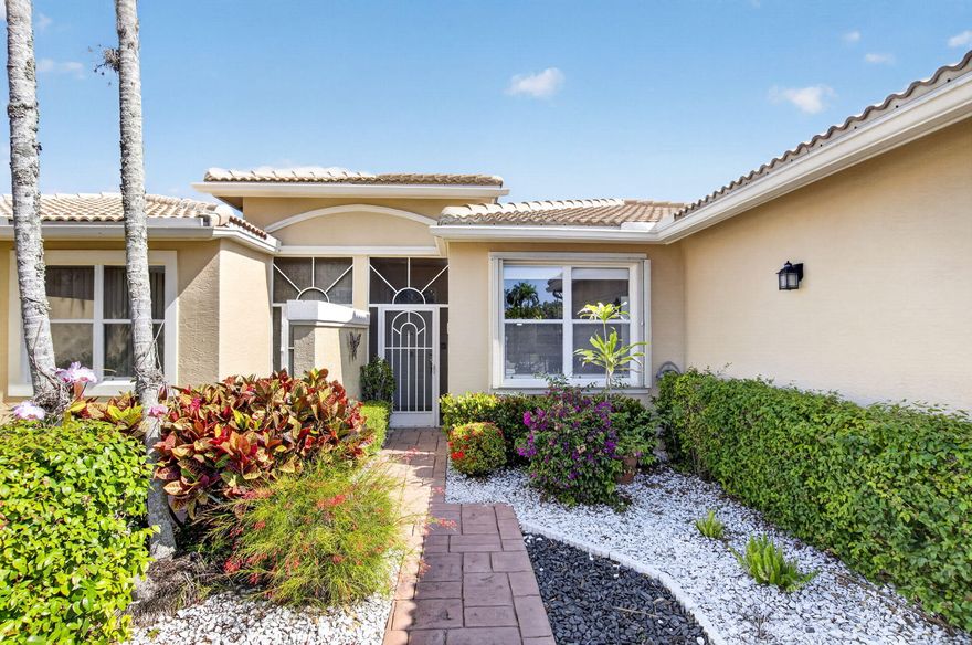 Gorgeously renovated waterfront villa features an expansive KOSHER KITCHEN, new stainless appliances, wide water views from the screened patio, 3 bedrooms, 2 updated baths, 1 car garage, wood grain tile flooring throughout main living areas plus skylights to bring in the sunshine. Freshly painted inside & features a 2022 roof, 2023 AC, newer WH & complete accordian shutters. Within WALKING DISTANCE TO WORSHIP and on the same street as the stunning clubhouse which features a ballroom with a regular calendar of shows & events, a heated pool, activity rooms for cards, billiards, arts & crafts and even a kiln! Tennis, pickleball & aerobics classes invite you to stay active year round. Majestic Isles is a gated & social 55+ community offering 24 hr security, lawn care & exterior maintenance.