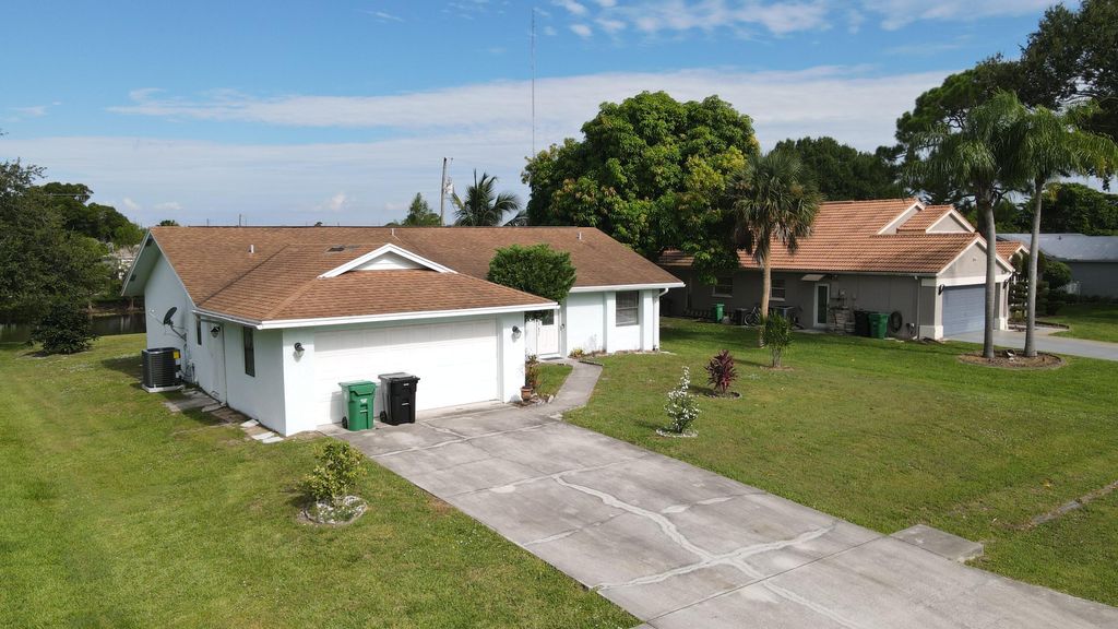 Photo of 2282 SE Mcmaster Street, Port Saint Lucie, FL 34952 (MLS # R11107515)