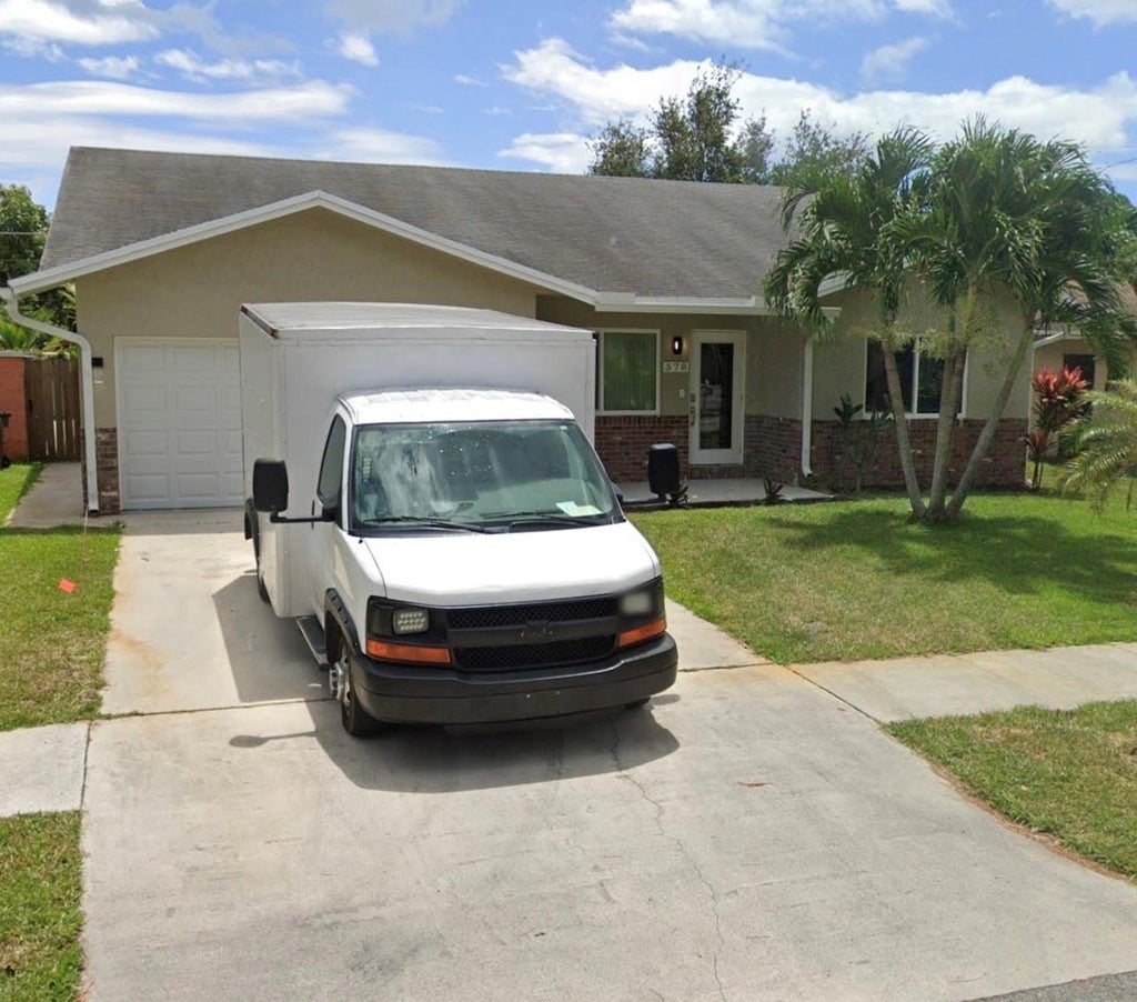 Photo of 378 SW 30th Ter, Deerfield Beach, FL 33442 (MLS # F10400771)